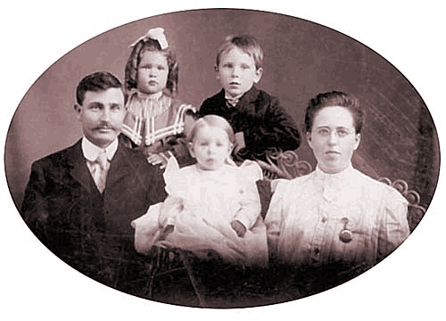 Eva and Ocsar Strine family portrait, ca. 1903