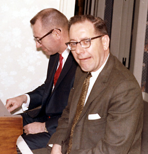 Robert Ross Fisher & James Lee Fisher playing the piano
