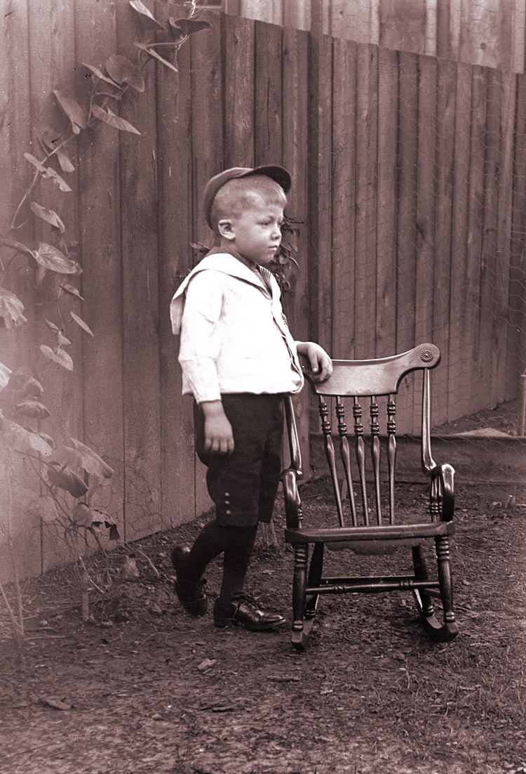 James Lee Fisher in a Sailor Suit standing on a chair, ca. 1898