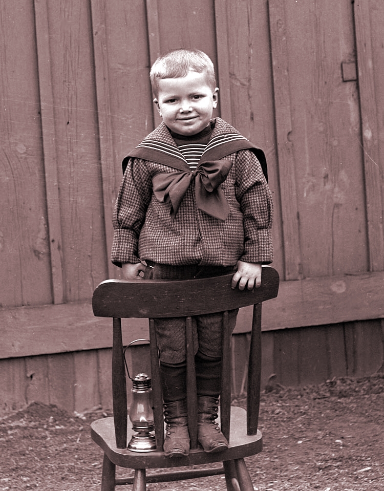 James Lee Fisher in a Sailor Suit standing on a chair, ca. 1898