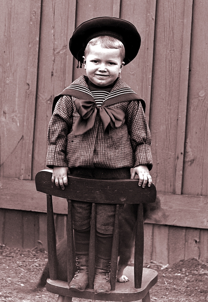 James Lee Fisher in a Sailor Suit standing on a chair, ca. 1898