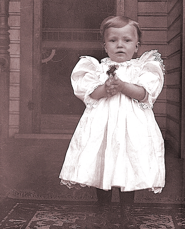 James Lee Fisher in a Dress on front porch, Carnegie, Pennsylvania, ca. 1897