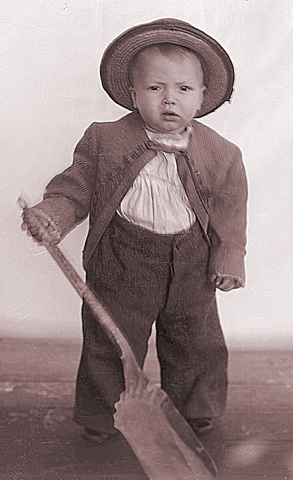 JJames Lee Fisher with a coal shovel, ca. 1897